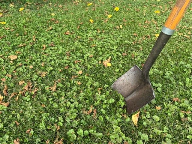 Shovel digging in the dirt