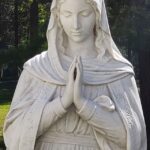 Woman praying which is one way to moisturize spiritual dryness